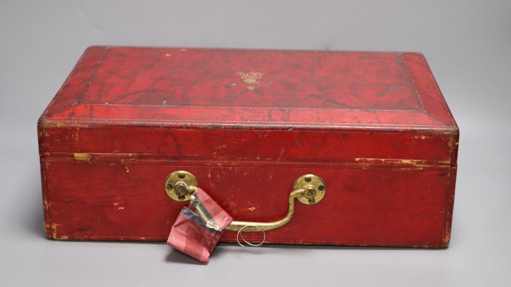 A red leather despatch box bearing King George V royal cypher, locked with key inside, width 41cm